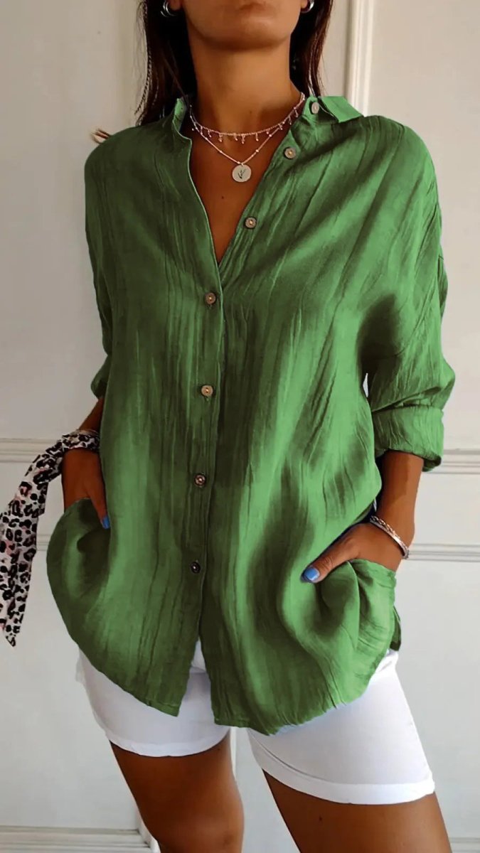 Women's Ancient Energy lapel long sleeve shirt with single-breasted design and pleated front, stylish and comfortable for casual wear.