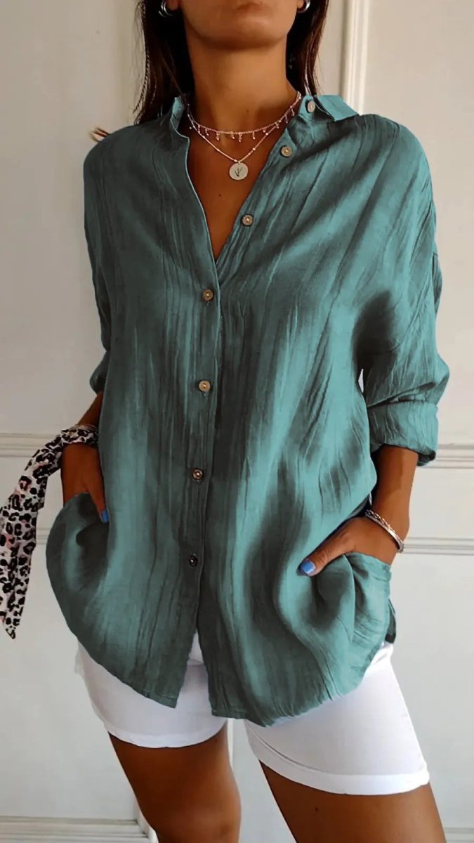 Women's lapel long sleeve shirt by Ancient Energy featuring a single-breasted design and pleated front, casual and stylish.