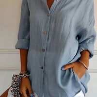 Women's Ancient Energy lapel long sleeve shirt with single-breasted design and pleated front, stylish and versatile clothing top.