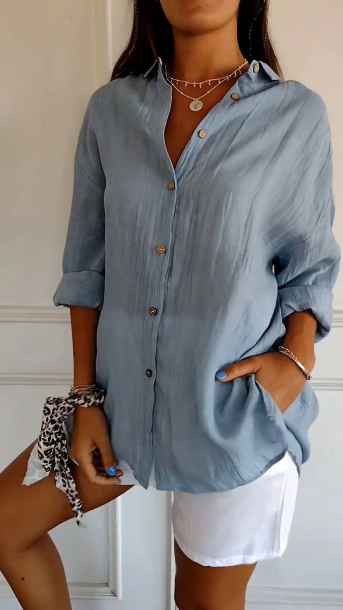 Women's Ancient Energy lapel long sleeve shirt with single-breasted design and pleated front, stylish and versatile clothing top.