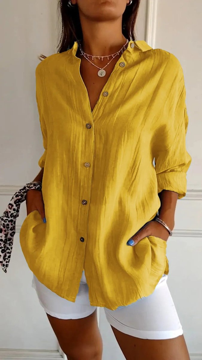 Ancient Energy women's lapel long sleeve shirt with single-breasted design and pleated front, stylish and versatile top.