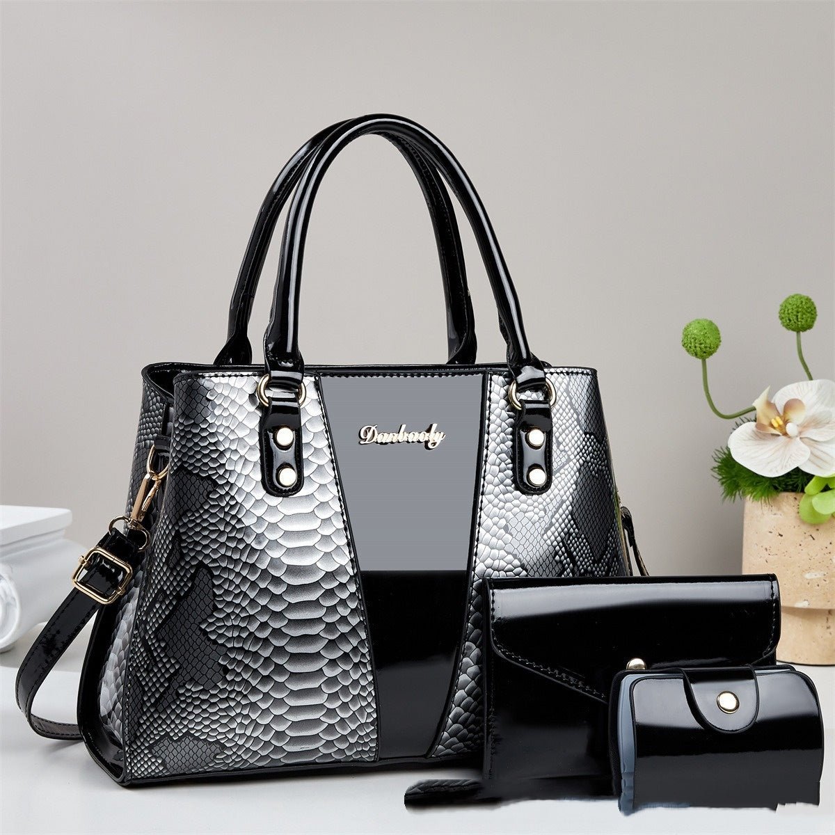 Large-capacity Ancient Energy shoulder and crossbody bag with a stylish snakeskin pattern, tote style handbag for versatile use.