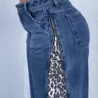 Leopard print zip-up jeans from Ancient Energy featuring a stylish animal pattern and classic denim fit.