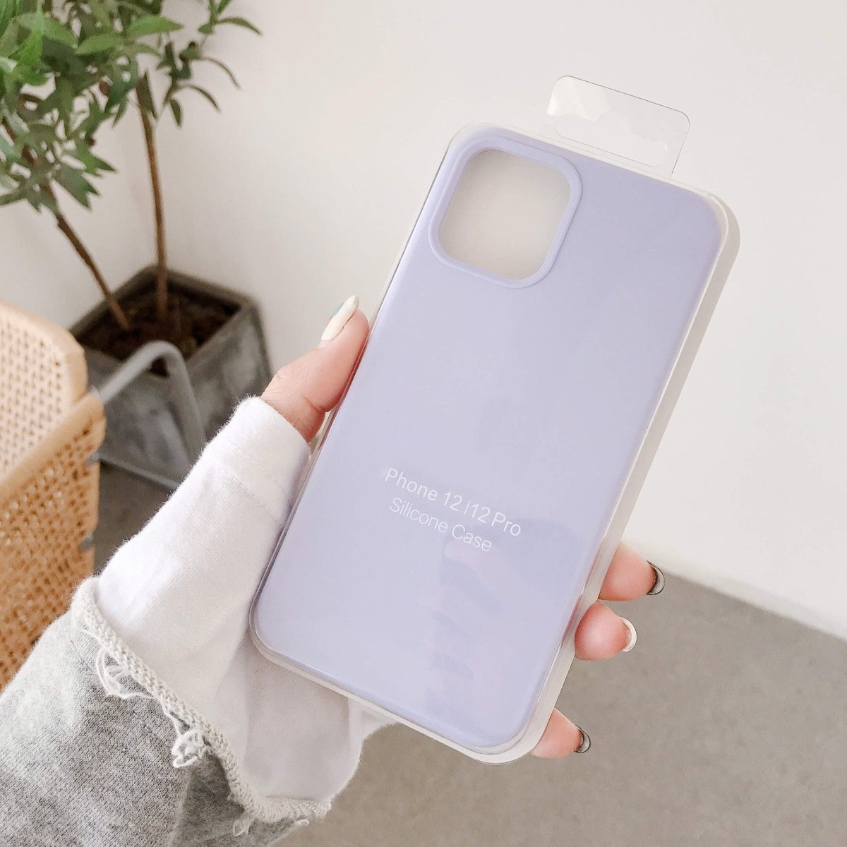 Ancient Energy liquid silicone mobile phone case accessories full package box with multiple protective and decorative components.