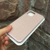 Ancient Energy liquid silicone mobile phone case accessories full package box with various case components and tools.