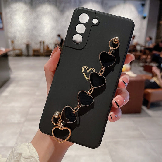 Ancient Energy Love Chain phone case with bronzing hollow design, drop-resistant for iPhone protection.