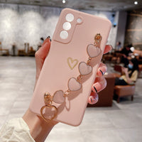 Ancient Energy Love Chain phone case with bronze hollow design, drop-resistant protection, and stylish appearance.