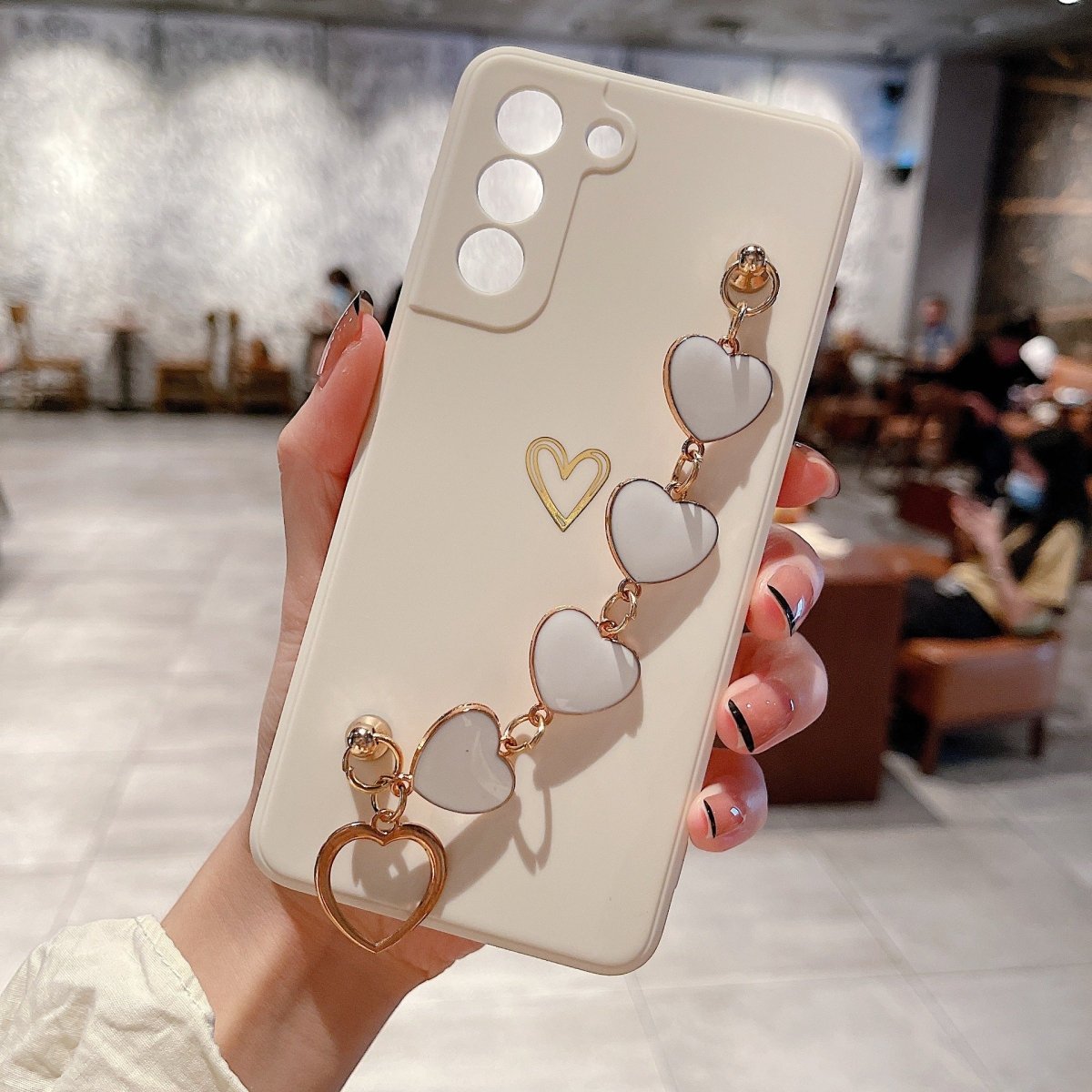 Ancient Energy Love Chain phone case with bronzing hollow design, drop-resistant construction, for a stylish and protective look.