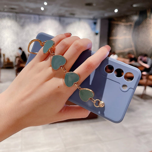 Ancient Energy Love Chain phone case with bronzing hollow design, drop-resistant protection for smartphones.