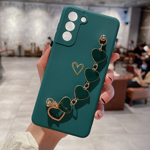 Ancient Energy Love Chain phone case with bronze hollow design, drop-resistant features, suitable for protecting smartphones.