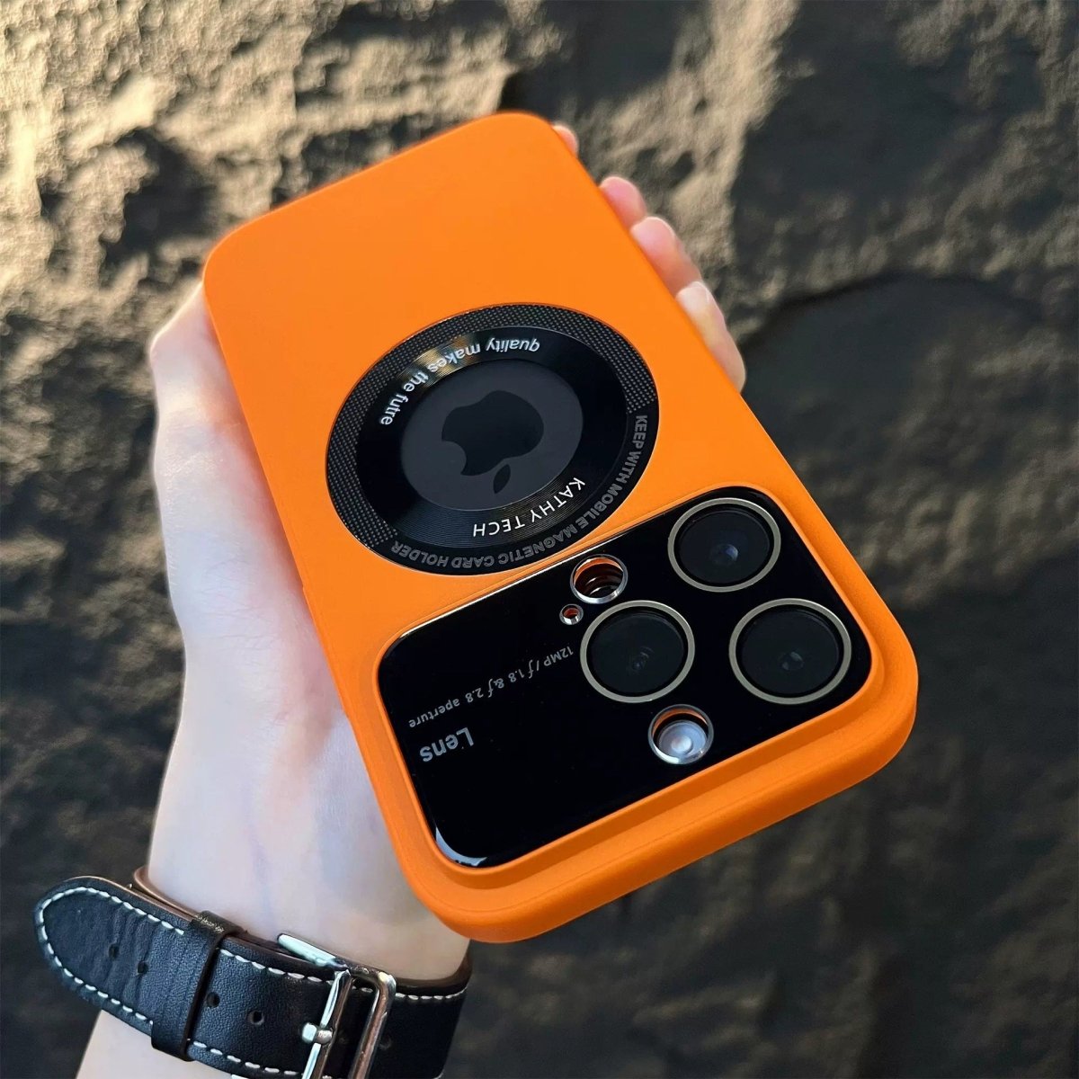 Ancient Energy magnetic suction large window protector phone case attached to a smartphone, showcasing its secure grip and sleek design.