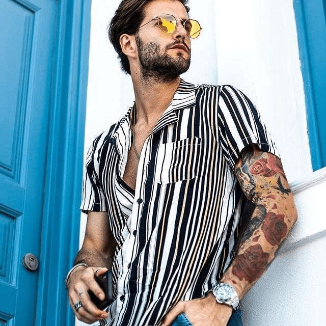 Men's Summer Holiday Hawaiian Shirt by Ancient Energy featuring colorful tropical floral print on lightweight fabric.