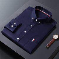 Men's casual and dress shirt by Ancient Energy featuring a stylish button-up design, perfect for business or casual wear.