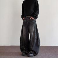 Ancient Energy men's high-street relaxed wide-leg pants in premium-looking fabric, styled casually with a folded waistband.