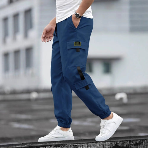 Men's retro jogger casual work pants from Ancient Energy, featuring a relaxed fit with elastic waistband and tapered legs.