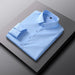 Men's slim-fit solid-color work shirt by Ancient Energy, showcasing a tailored design in a neutral fabric, suitable for professional wear.