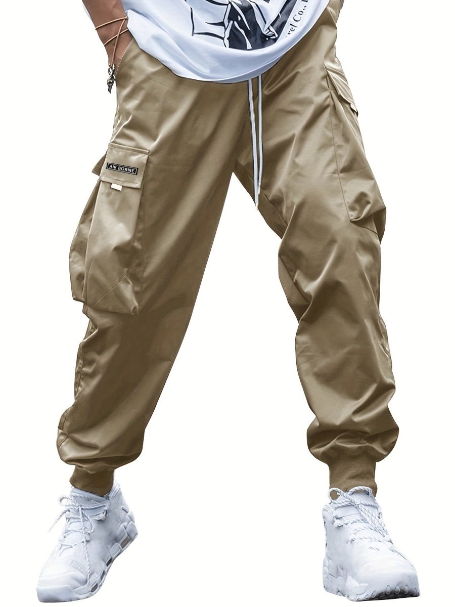 Ancient Energy men's multi-pocket cargo pants with drawstring waist, casual streetwear style, suitable for outdoor and sports activities.