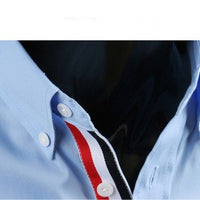 Men's long-sleeved shirt by Ancient Energy, shown in a stylish fit with a classic collar and button-down design.