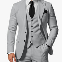 Elegant men's three-piece business suit by Ancient Energy, featuring a jacket, vest, and trousers in classic dark fabric.
