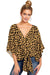 Ancient Energy women's V-neck blouse with leopard print, floral tie front, batwing sleeves, and oversized fit for summer wear.