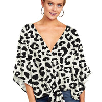 Ancient Energy women's V-neck blouse with leopard print, floral tie-front design, batwing sleeves, and oversized summer fit.