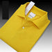 Ancient Energy men's and women's polo shirts in various colors, featuring classic collar and short sleeves, made from comfortable fabric.