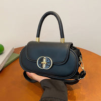 Ancient Energy Premium Retro Matte Tote Bag with autumn-inspired design, crossbody strap, and mini round shape.