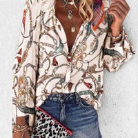 Printed long sleeve V-neck button blouse for women by Ancient Energy, featuring a stylish design and comfortable fit.
