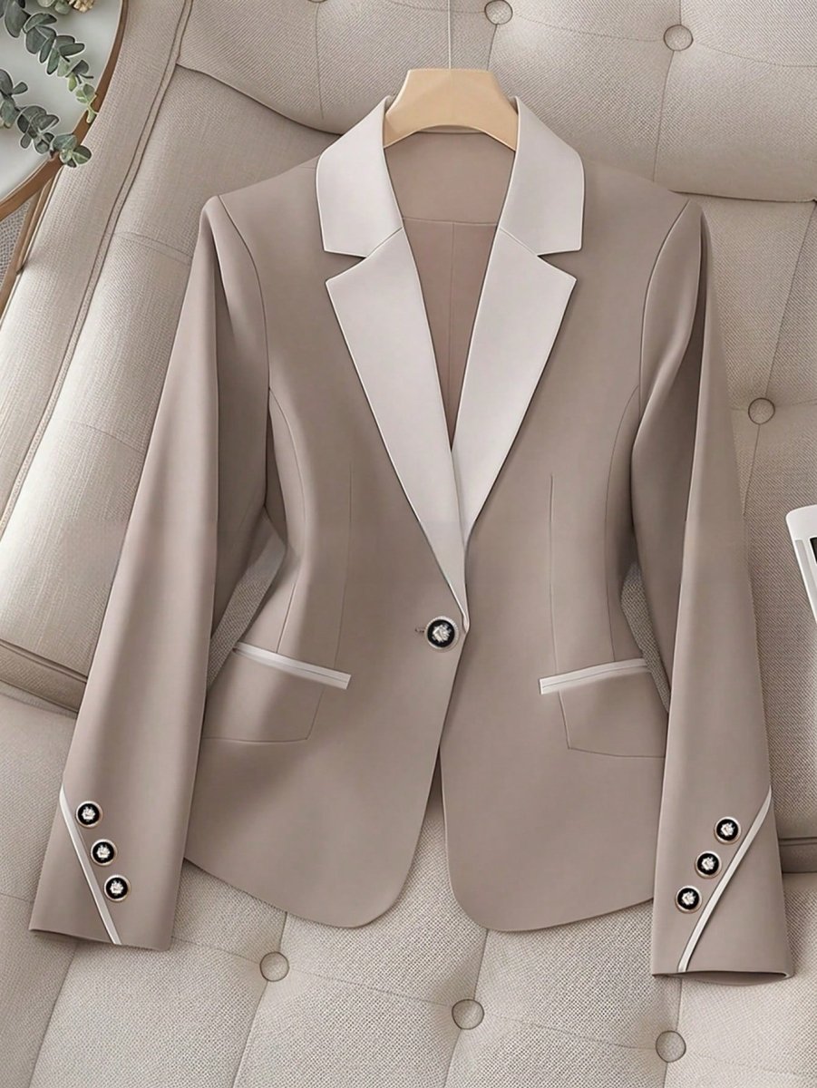 Elegant formal blazer by Ancient Energy featuring contrasting color buttons, tailored fit, and sleek design for professional occasions.