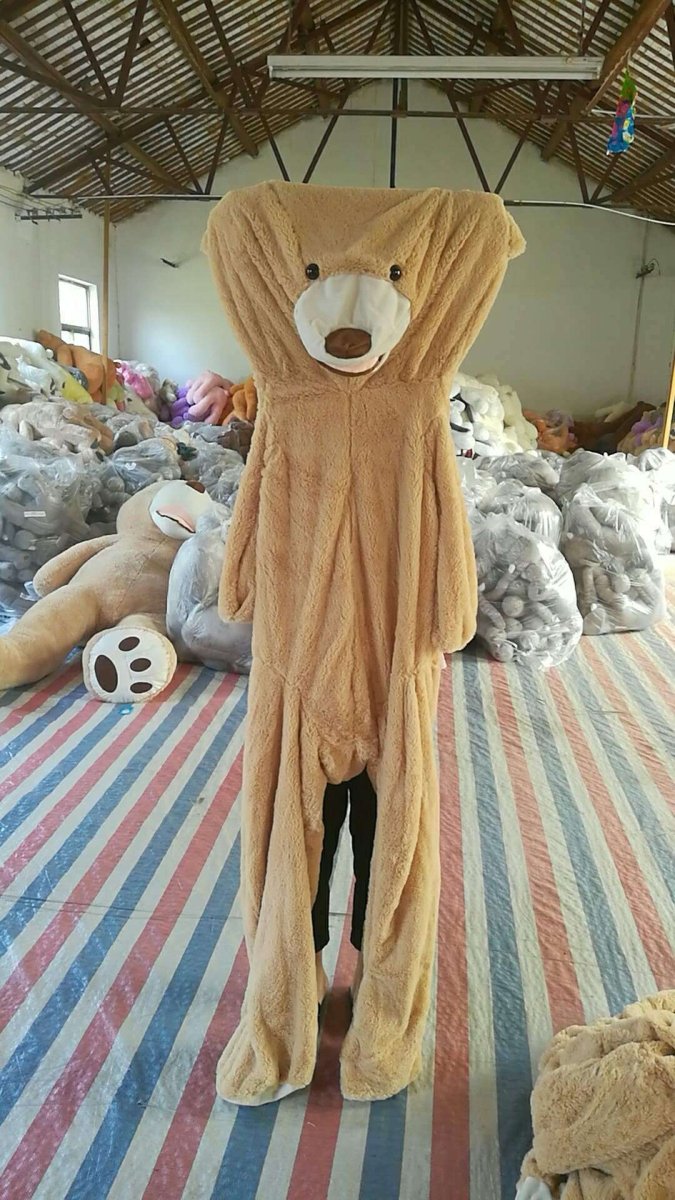Soft and charming plush bear toy by Ancient Energy, featuring realistic details and a safe, cuddly design for children.