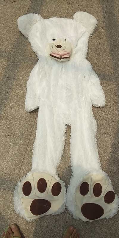 Realistic plush bear toy by Ancient Energy, soft, safe, and charming with detailed fur and friendly expression.