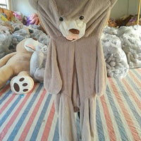 Realistic plush bear toy from Ancient Energy, soft and charming, perfect for cuddling and safe for children.