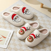 Pair of warm Santa Claus cartoon cotton slippers with furry lining, designed for couples, by Ancient Energy, perfect for winter comfort.