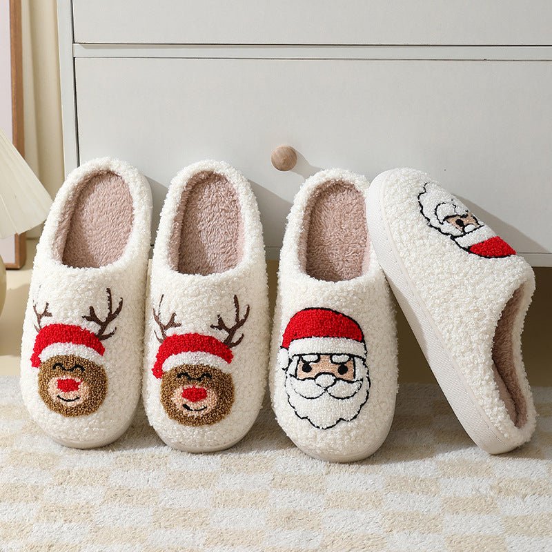 Pair of Santa Claus cartoon cotton slippers by Ancient Energy, featuring warm furry winter shoes for couples.