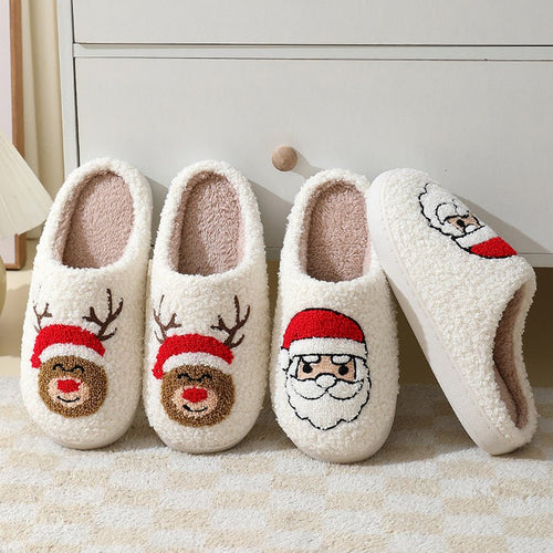 Pair of Santa Claus cartoon cotton slippers by Ancient Energy, featuring warm furry winter shoes for couples.