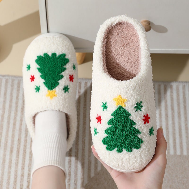 Pair of Santa Claus cartoon cotton slippers by Ancient Energy, featuring warm, furry winter shoes for couples.