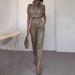 Ancient Energy shoulder slimming waist belt with decorative blouse and pants, showcasing a stylish and slimming fashion ensemble.