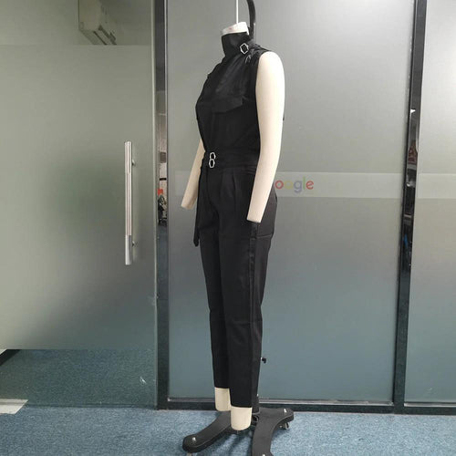 Ancient Energy shoulder slimming waist belt paired with a blouse and pants, highlighting stylish waist-slimming accessory.
