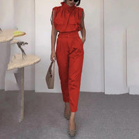 Ancient Energy shoulder slimming waist belt with decorative blouse and pants, stylish and figure-enhancing fashion ensemble.