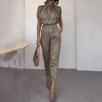 Ancient Energy shoulder slimming waist belt with decorative blouse and pants, highlighting stylish and comfortable waist-slimming fashion.
