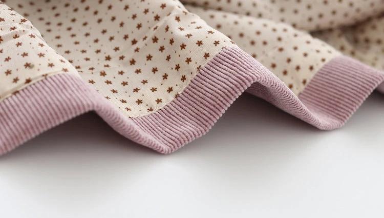 Baby girl in a spring Korean dress with a corduroy skirt and blouse, by Ancient Energy, suitable for children.