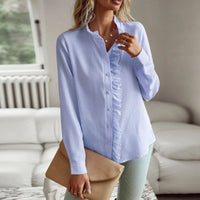 Ancient Energy striped long sleeve shirt for women with ruffle detail, button-up design, suitable for casual office or commuting wear.