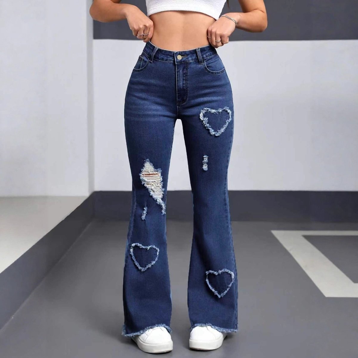 Casual women's denim jeans from Ancient Energy featuring a classic blue wash and relaxed fit, suitable for everyday wear.