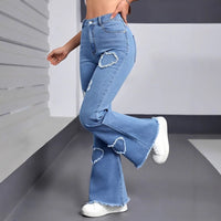 Pair of stylish casual denim jeans for women by Ancient Energy, featuring classic fit and medium wash fabric.