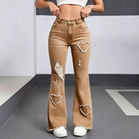 Pair of stylish casual denim jeans for women by Ancient Energy, featuring a classic fit and light blue wash.