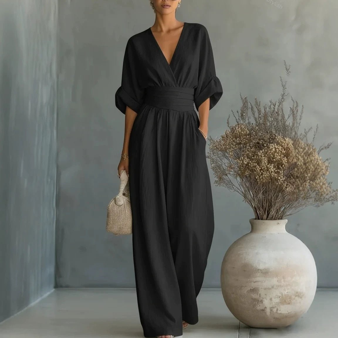 Ancient Energy women's summer short-sleeved jumpsuit with V-neck, wide-leg pants, casual fashion style, lightweight and comfortable.