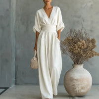 Ancient Energy women's summer short-sleeved jumpsuit with V-neck and wide-leg pants, casual fashion outfit displayed in the image.