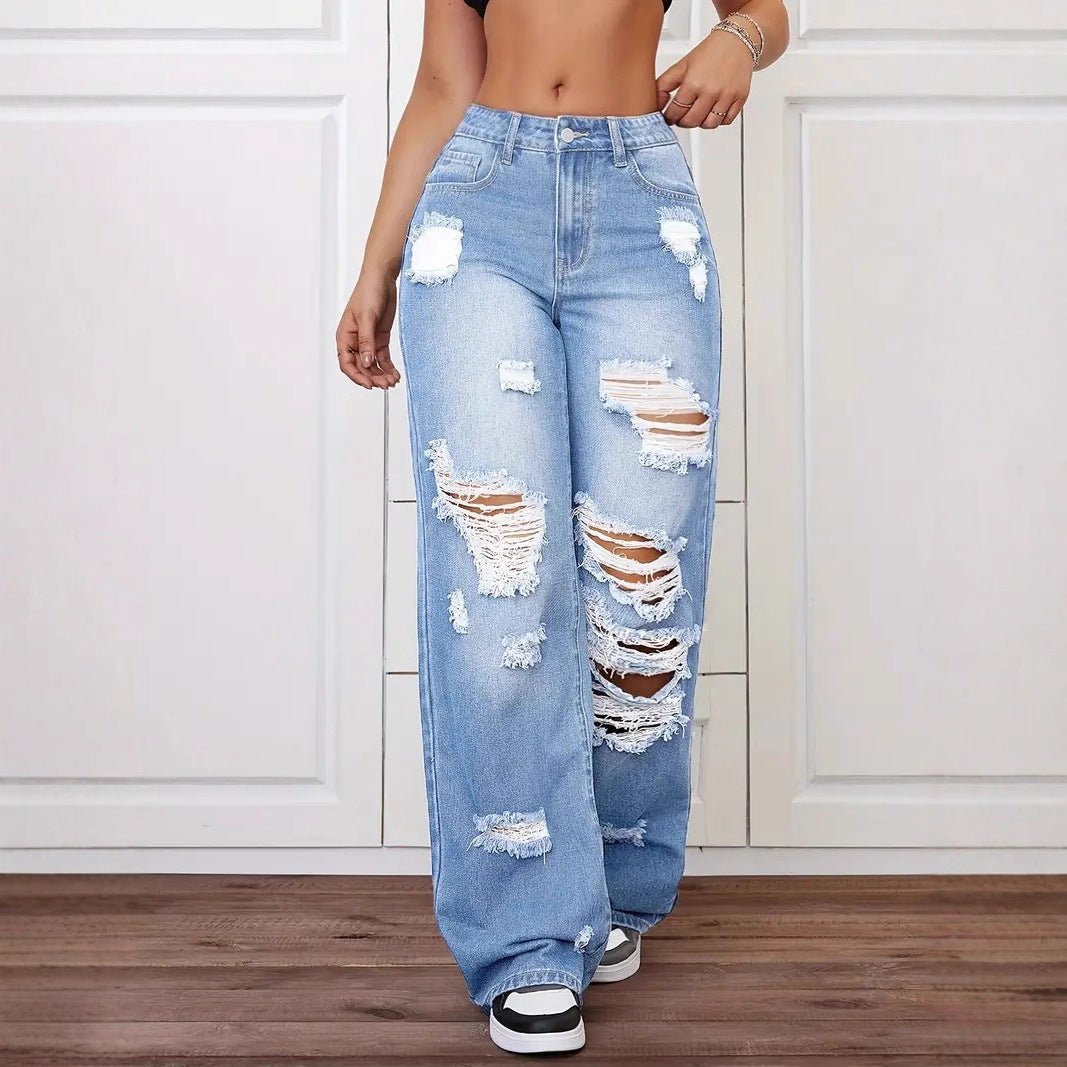 Pair of trendy washed ripped straight jeans for women by Ancient Energy, showing distressed denim style and classic fit.