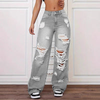 Women’s washed ripped straight jeans by Ancient Energy featuring a trendy distressed look and classic fit.