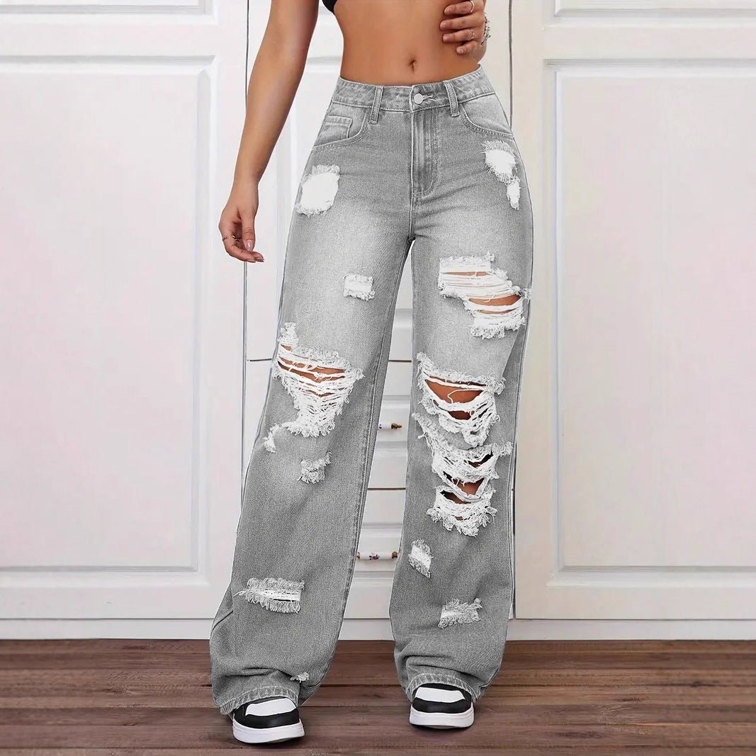 Women’s washed ripped straight jeans by Ancient Energy featuring a trendy distressed look and classic fit.